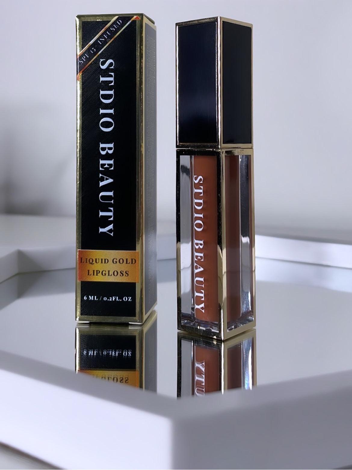 INTERLUDE | LIQUID GOLD LIP GLOSS.