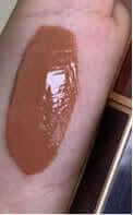 INTERLUDE | LIQUID GOLD LIP GLOSS.