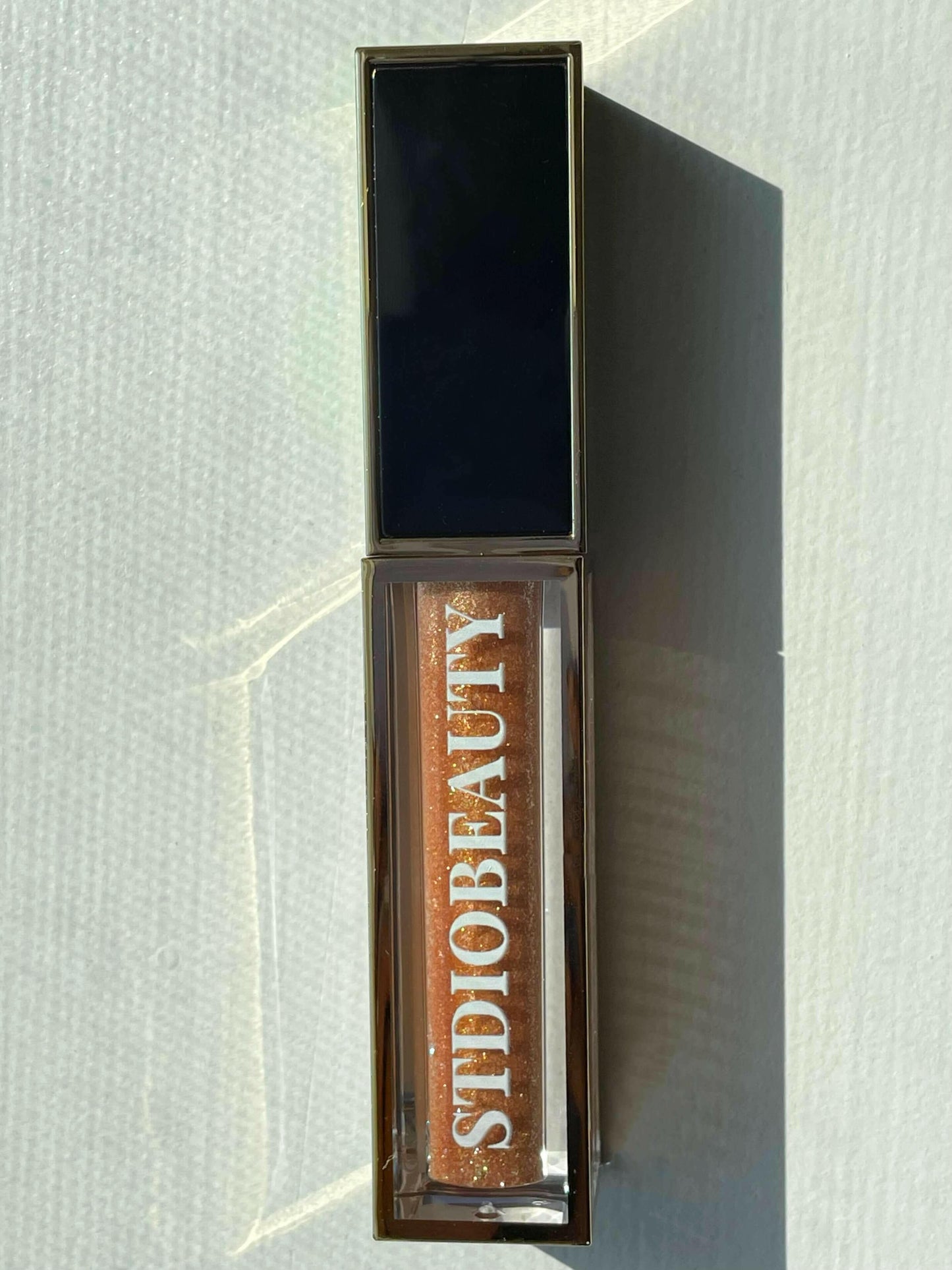 DIVA | LIQUID GOLD LIP GLOSS.