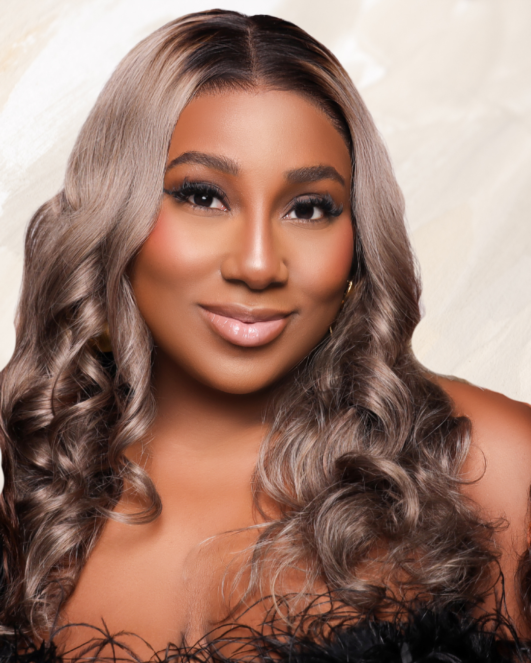 Model wearing STDIO Beauty Winter Lace Frontal Ash Blonde Wig with soft waves and natural hairline